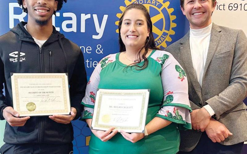 L-R: Chris Lowe and Megan Calicott of Greene County High School pose with Dr. Tyler Franks. CONTRIBUTED