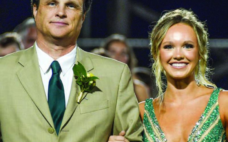 Homecoming Queen Presley Elizabeth Moss with her father Jay Moss. IAN TOCHER/Staff