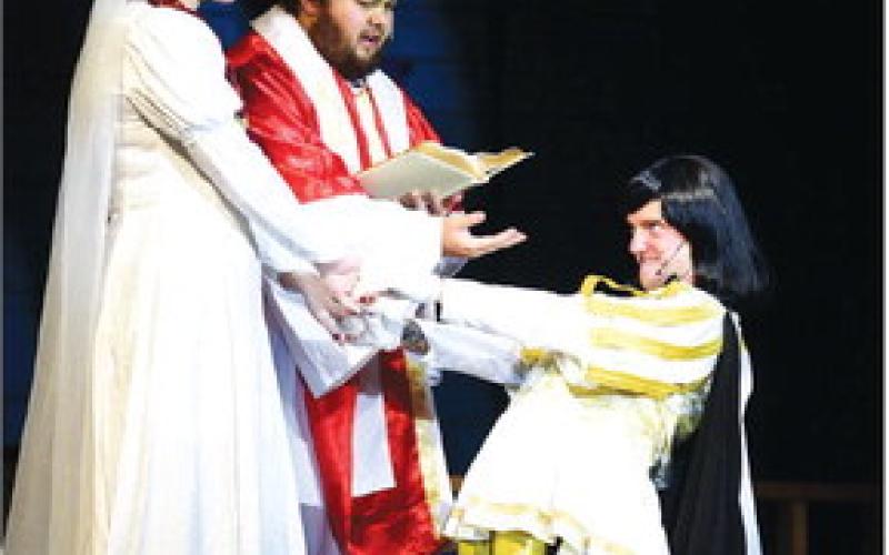 Actress Lylli Flanders as “Fiona” appears less than thrilled at the prospect of marrying Lord Farquaad (right), played by Cole Miller.