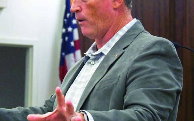 Dr. John Wheeler of Pathfinders Counseling Service makes a point about pursuing good mental health last Tuesday during a community safety forum presented by the Eatonton-Putnam Chamber of Commerce. IAN TOCHER/Staff