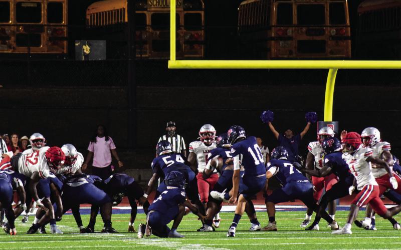 Putnam kicker Alex Jiminez makes a long field goal in the closing seconds of the first half Friday night at home versus the Laney Wildcats. BRANDON PARK/Staff