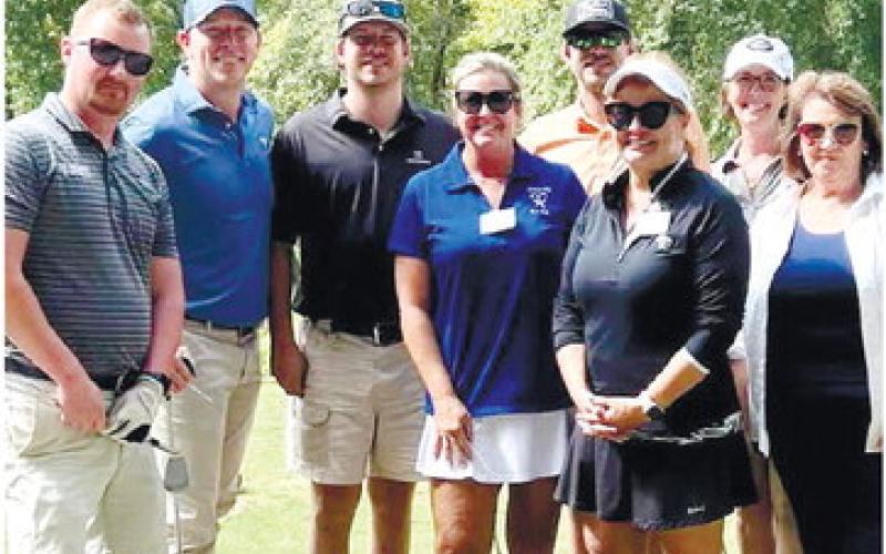 The Ocmulgee Court Appointed Special Advocates (CASA), which serves children in foster care in Baldwin, Greene, Hancock, Jasper, Jones, Morgan, Putnam and Wilkinson Counties, held its 19th annual Swing a Club for CASA golf tournament Sept. 8, at the Bear’s Best course in Suwanee. Pictured with one of the participating foursomes are members of the Ocmulgee CASA staff, (l-r): Suzanne Mathis, Lori Muggridge, Dana Lowe and Elaine Odom. CONTRIBUTED