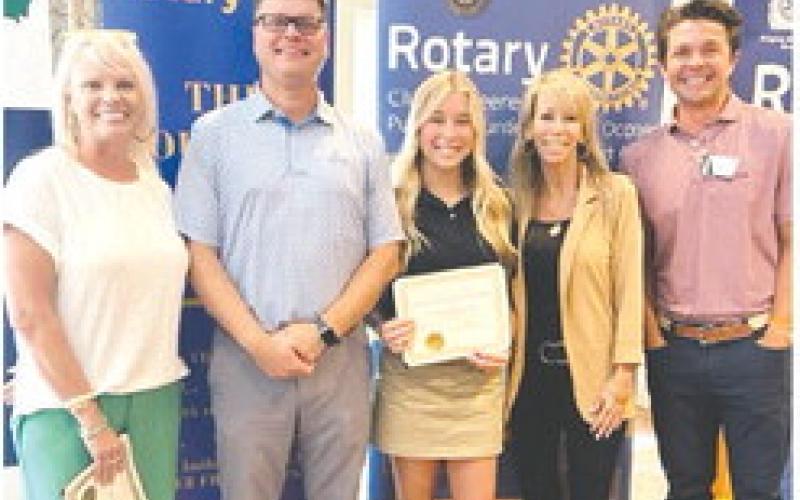 Beth Moss, Scott Cannon, Carly Cannon, Jan Cannon, and Rotarian Dr. Tyler Franks pose together. CONTRIBUTED
