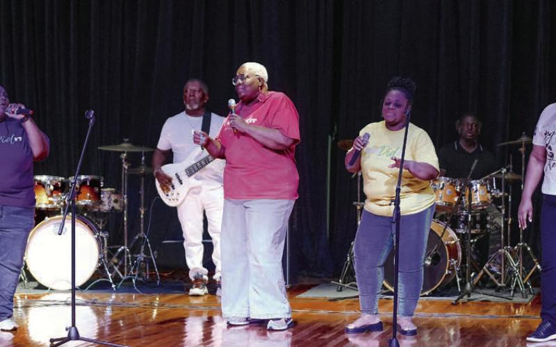 The Putnam County Gospel Ensemble performed two songs for an intimate but engaged audience. IAN TOCHER/Staff
