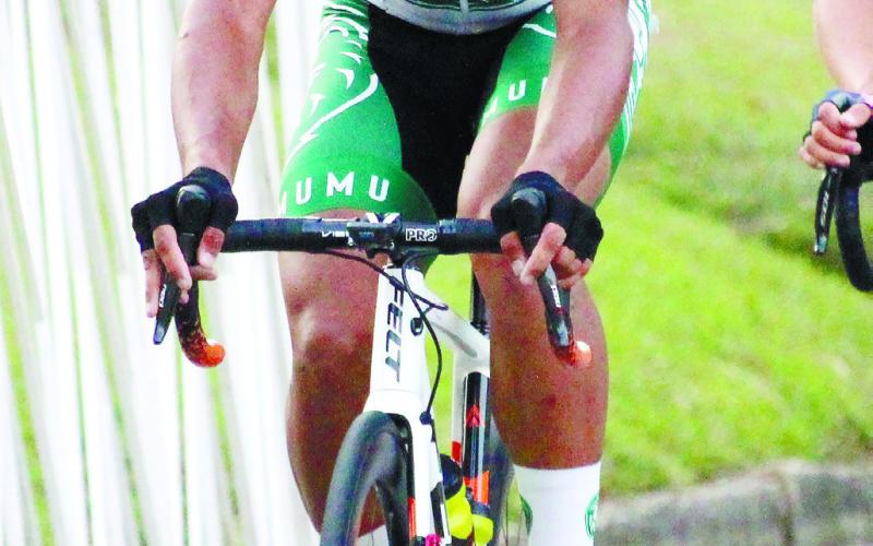 Eatonton’s own Dylan Lindsey, a member of the Piedmont University collegiate cycling team, had a top 10 finish in Saturday’s criterium but was forced into an early withdrawal from the road race on Sunday. TREY NORRIS/Staff