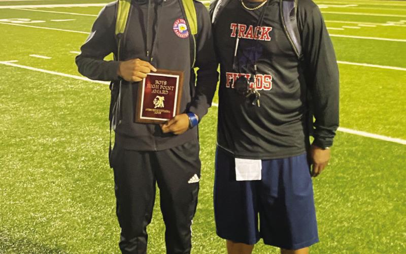 Putnam County junior Bill Waters (left) with head coach Kedric Manning (right). CONTRIBUTED