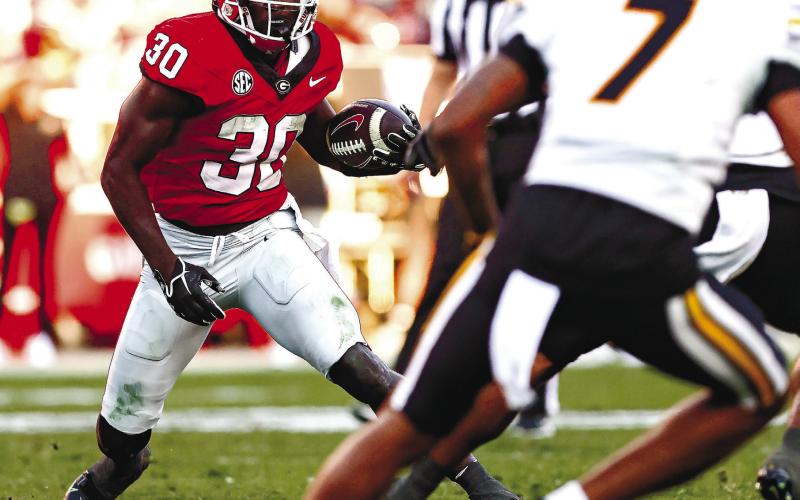 Daijun Edwards (30) rushed for 77 yards on 16 attempts last week in Georgia’s win over Missouri. TONY WALSH/UGA Athletics