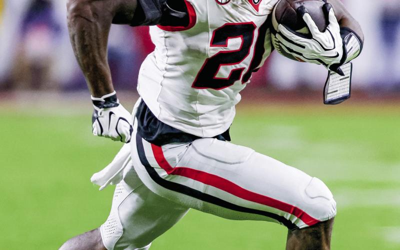 Georgia running back Dwight Phillips Jr. (20) led the team in the absence of Nate Frazier with 120 yards on 17 carries. COURTESY OF UGA ATHLETICS