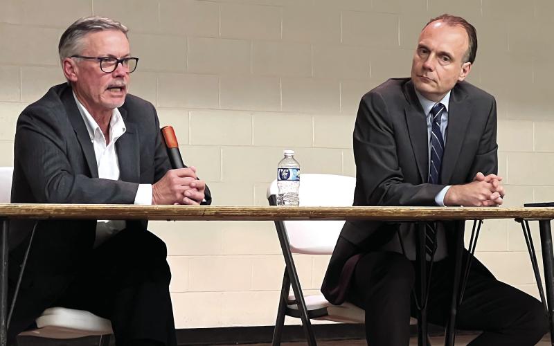 Putnam County District 2 Commissioner Daniel Brown (left) and challenger Richard Garrett spoke before interested voters last Thursday at the Butler-Baker school in Eatonton. A follow-up faceoff is scheduled for 6:30 p.m. this Thursday at The Plaza Arts Center. IAN TOCHER/Staff