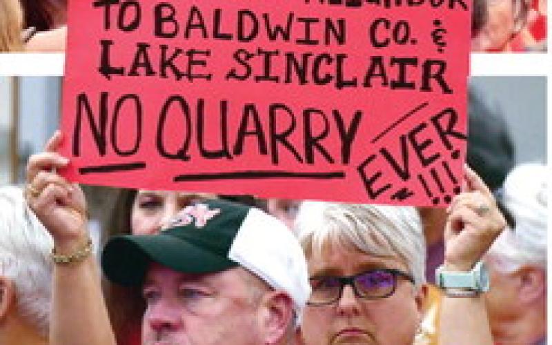 Protesters from neighboring areas showed up to oppose rezoning the proposed quarry site alongside Putnam County’s Dennis Station Road. IAN TOCHER/Staff