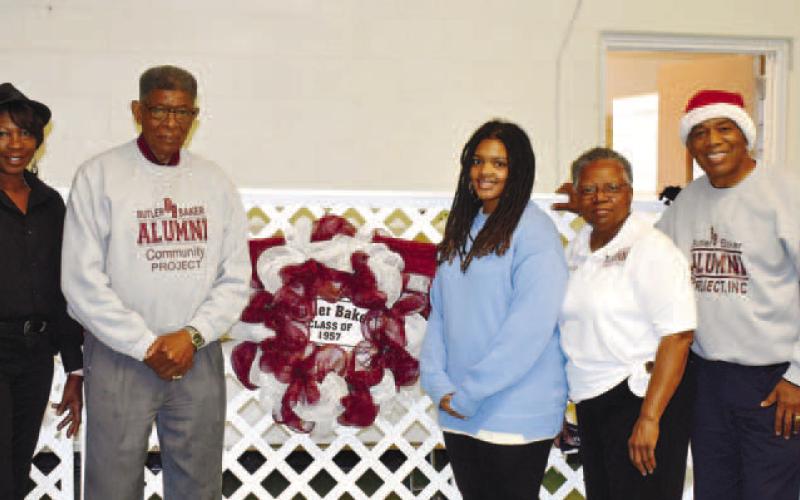 Posing for the photo after the seminar are, left to right, speaker Jeffery Watts, volunteer to BBAP Thelma Humphries, BBAP board member Bobby Parham, BBAP member Kahliyah Thompson, assistant CFO Annie Lawn; BBAP President Melton Smith; and BBAP member Shug Dennis.