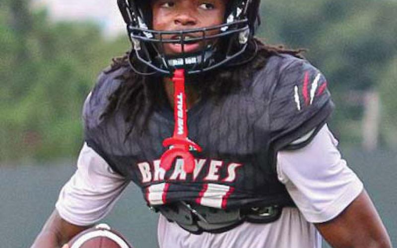Baldwin senior Kamden Patterson returns as the Braves’ starting quarterback this season, bringing valuable experience back to the offense. TREY NORRIS/Staff