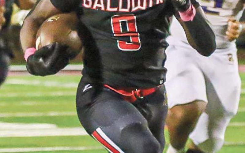 Tavares Hooks rushed for 710 yards and seven touchdowns last year and will be looking to make an even bigger impact as a junior this season. TREY NORRIS/Staff