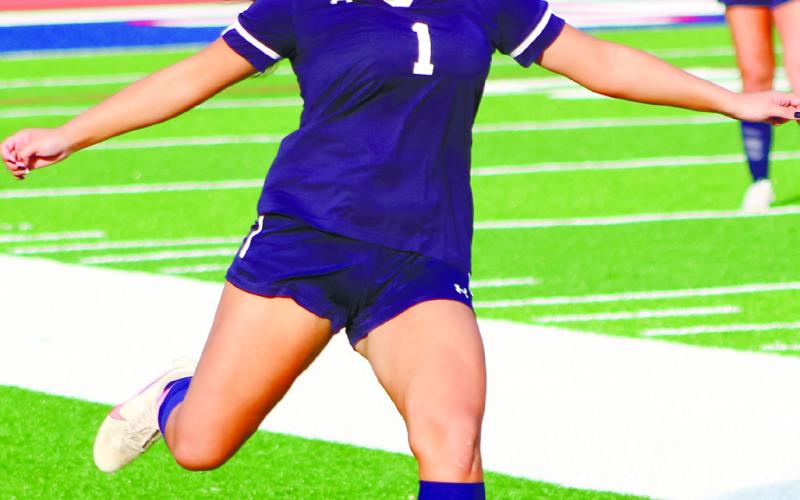 Senior Eva Espin (1) moves the ball upfield to set up a score. ARELLA CASH/Staff