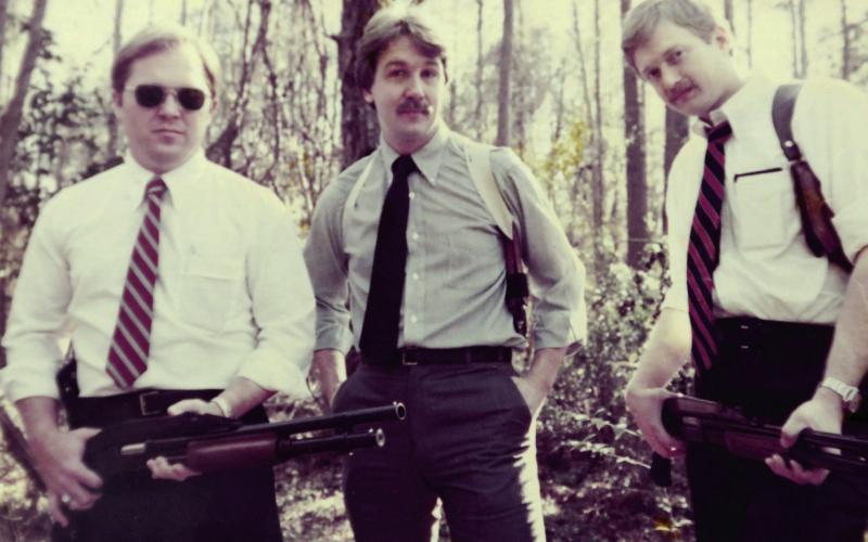 Still a deputy in the early 1980s when Sills (left) estimates this photo was taken, he and a pair of fellow lawmen were “out hunting fugitives” that day. CONTRIBUTED