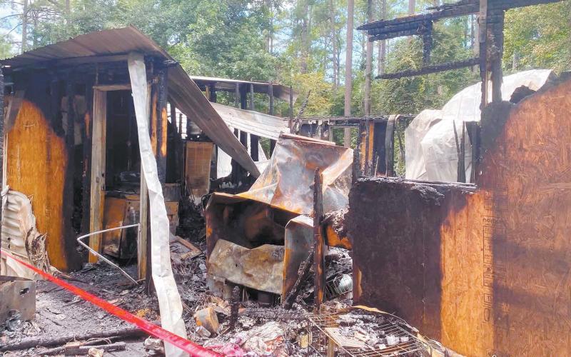 The mobile home on Sunset Drive is totally destroyed after a fire. The family’s pets perished in the fire. CONTRIBUTED