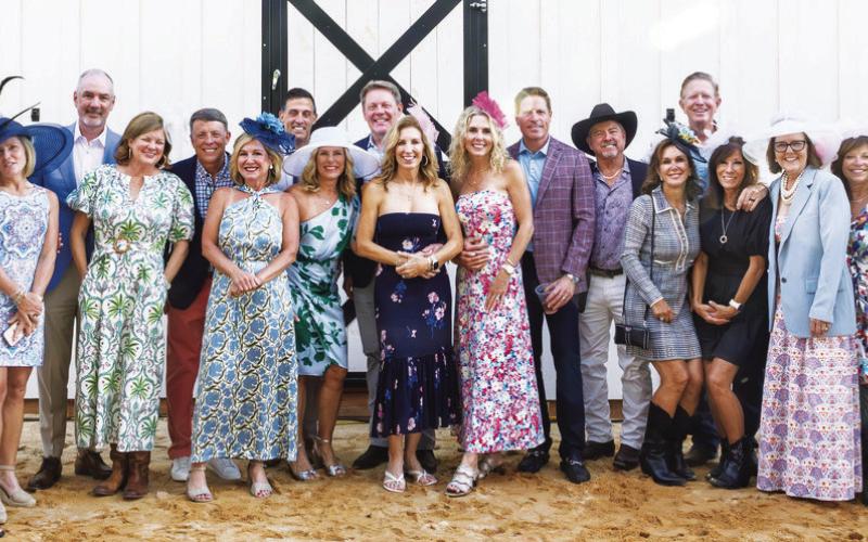 Guests at the inaugural Hats, Horses &amp;amp; Helping Hands Derby fundraiser to benefit Neighbors Helping Neighbors arrived in their Derby best, sporting colorful hats and seersucker suits while sipping traditional mint juleps at Putnam County’s Lake Oconee Equestrian Center. CONTRIBUTED