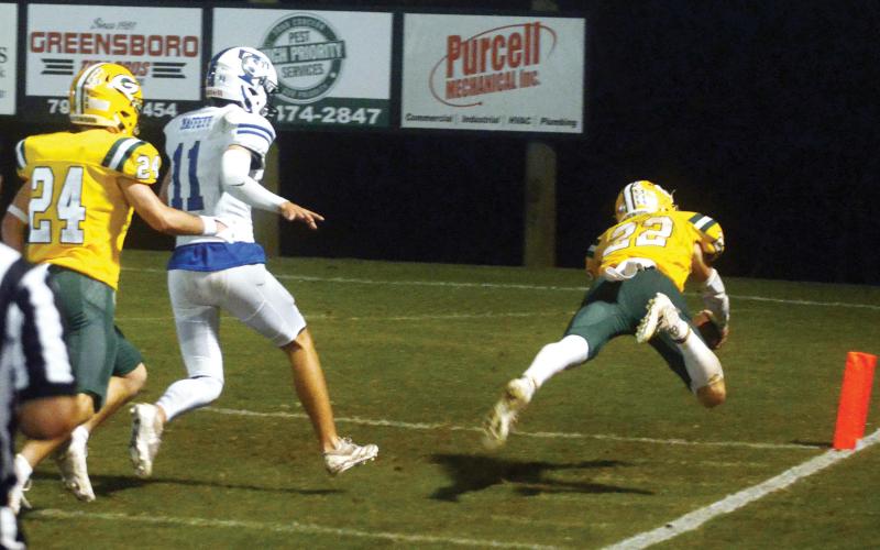 This diving play early in the second half by Hunter Johnson (22) marked the start of an impressive comeback for the Gators, who punched their ticket to Damascus for a semi-final playoff showdown this Friday against Southland Academy. IAN TOCHER/Staff