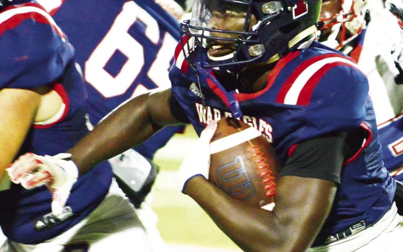 Rashod Daniel carries the ball for Putnam County earlier this school season. IAN TOCHER/Staff