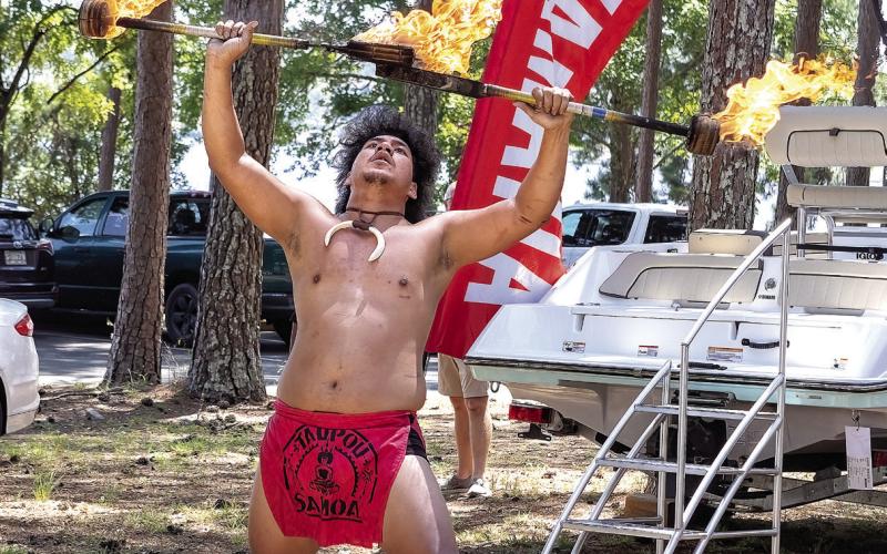 Chief Reota traveled from Samoa to perform his fire dance. (LEIGH LOFGREN/Staff)