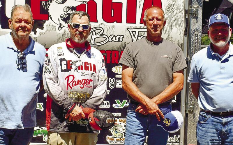 Organizers of the first Masonic Bass Tournament, left to right, past Master and Junior Deacon of Lodge No. 4 Michael Cumbie, GBT owner Michael Tarrer, Senior Steward of Lodge No. 4 Greg Smith, and Worship Master of Lodge No. 4, Michael Gailey. LENA HENSLEY/Staff