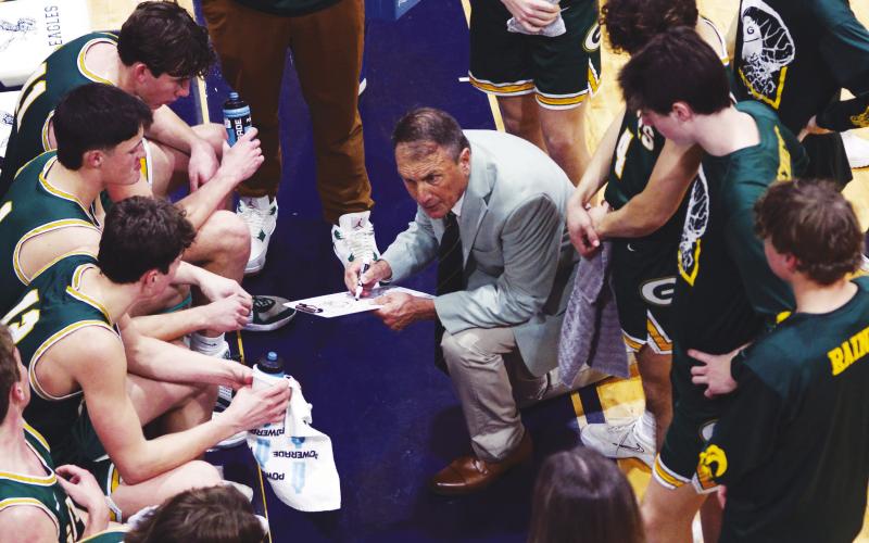 Gatewood head coach Don Keiser addresses his team late in the final quarter on Saturday at Macon’s Stratford Academy. Despite suffering a 64-62 quarterfinal loss to region rival Brentwood in GIAA AA state playoffs, Keiser emphasized he remained proud of his team and its results this season. IAN TOCHER/Staff