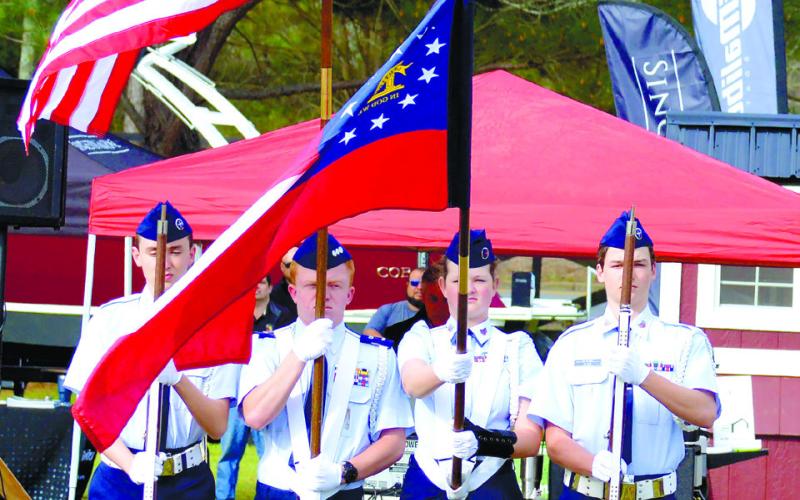 Before The Big Event started, a color guard from Lake Country Composite Squadron Civil Air Patrol marches and presents flags during the national anthem.