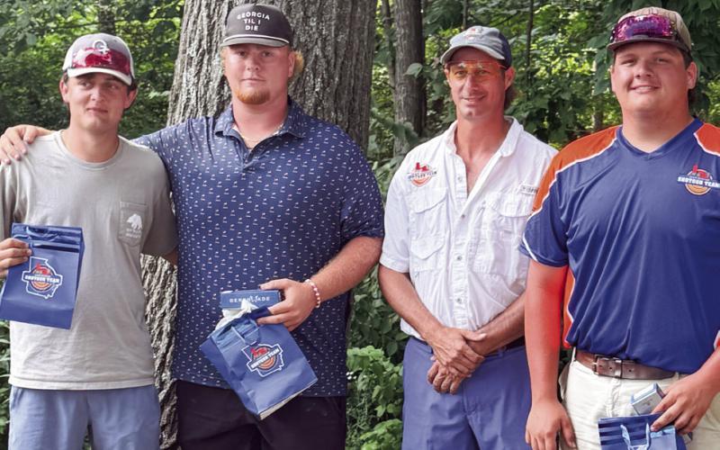 L-R: Austin Marshal, Blake Daniel, Head Coach John Bush, and Jake Pope. CONTRIBUTED