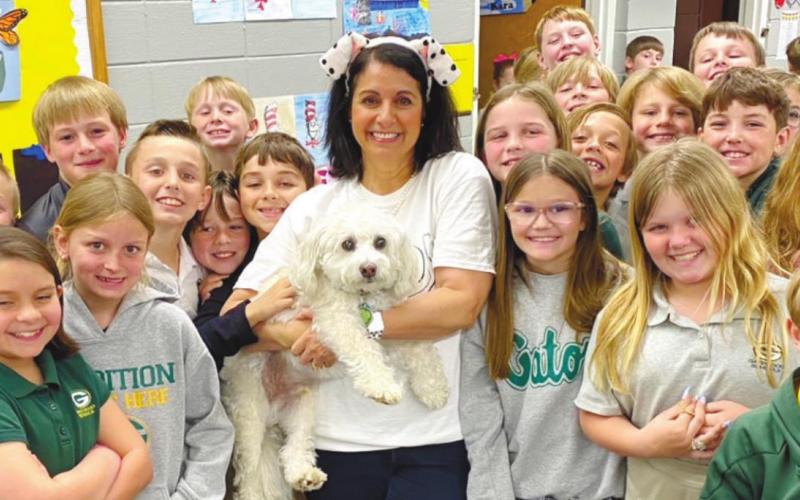 Author Andrea Cassell and Kibby with students from Gatewood. CONTRIBUTED