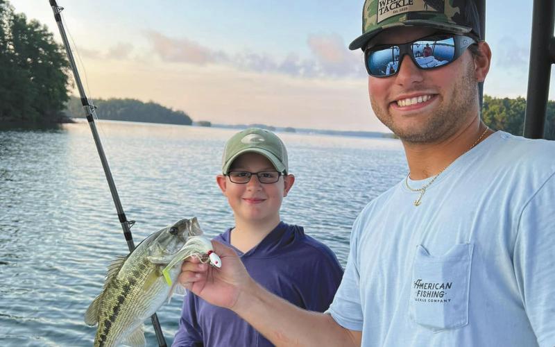 Beau and Ryan with a spotted bass.