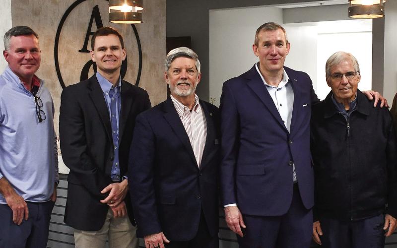 L-R: Dr. Brian Williams of Athens Orthopedic Clinic Urgent Care, AOC Sports Medicine, Dr. Logan Fields, AOC Joint Replacement Surgery, Dr. Clayton Wing, Putnam County Chamber of Commerce President Robbie King, AOC CEO Mike Boblitz, Sparta Mayor R. Allen Haywood, and AOC Sports Medicine, Dr. Steve Johnson. IAN TOCHER/Staff