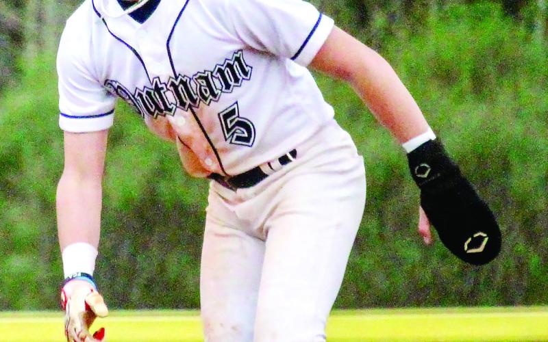 Sophomore Ethan Whatley (5) reached base safely on an infield error by Westside, scoring a runner to give Putnam County a 5-0 lead in the bottom of the first. TREY NORRIS/Staff