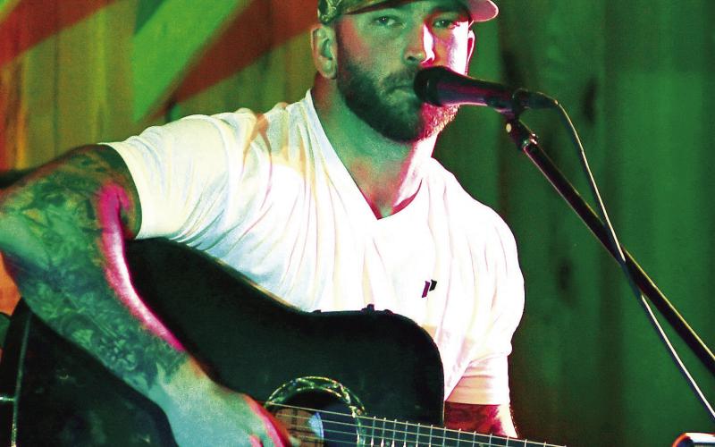 Songwriter Josh Phillips said he truly enjoyed his visit to Lake Country and thanked his “500 or so friends” who attended “Songwriters Night” at Briarpatch Farm. IAN TOCHER/Staff
