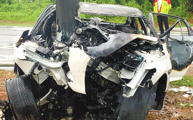 An Eatonton man died when his car crashed into the traffic light pole on Highway 44 at Scott Road and burst into flames. Passersby pulled the man out of the car before it burned. CONTRIBUTED/PCSO