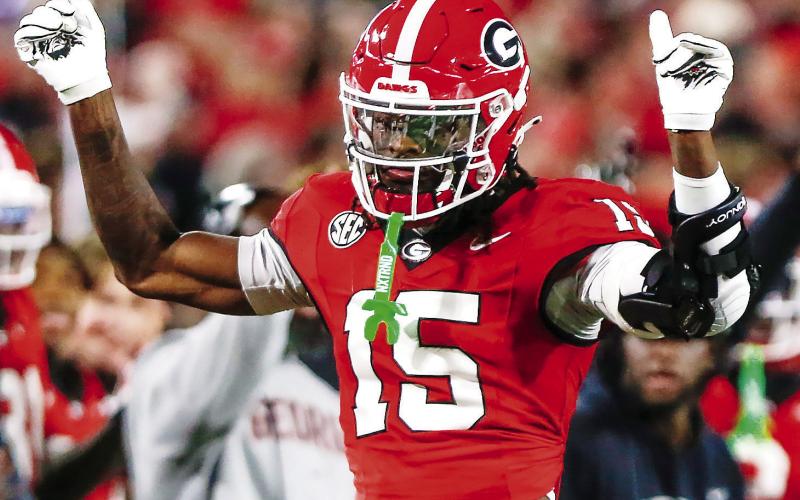 Georgia cornerback Demello Jones (15) totaled four tackles, including being credited with half a tackle for loss and a pass breakup against the Longhorns. LANCE McCURLEY/Staff