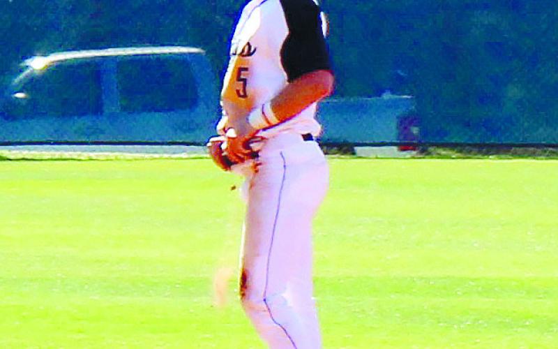 Briggs Eady (5) stands on second base as he waits for a JMA teammate to make contact at the plate to send him home. TREY NORRIS/Staff