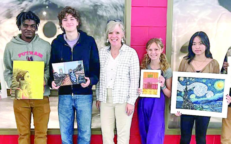 Members of the Putnam County High School AP art class (l-r) Levi Piper, Jonquail Coats, Evan Nipper, Abigail Hildreth, Kristina Xiong, and Dre’Shon Monday with their teacher, Nancy Mason (center). CONTRIBUTED