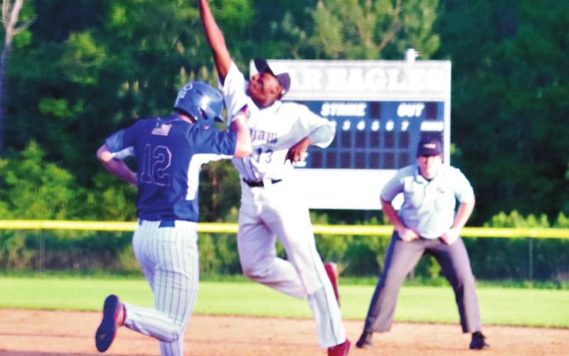 B.J. Ruff catches the ball for an out at first base. KIM CASH/Staff