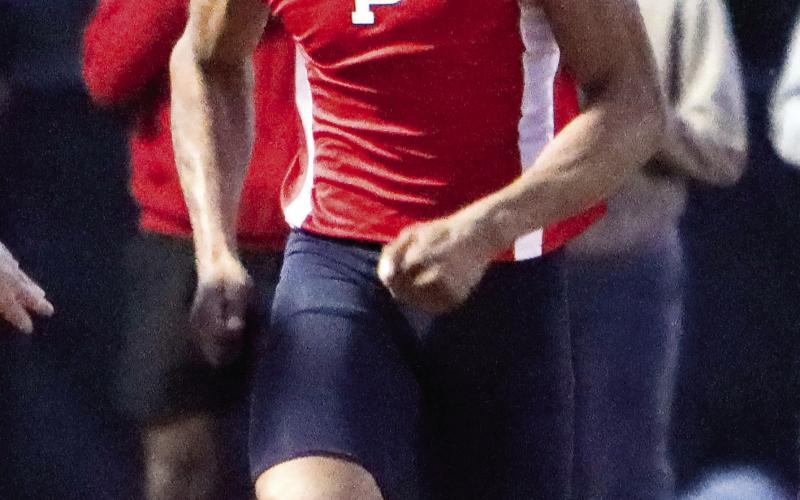 PCHS senior Alan Hill sprints toward the finish line during the 100-meter dash at the Greene County Tigers Invitational last week. LANCE MCCURLEY/Staff
