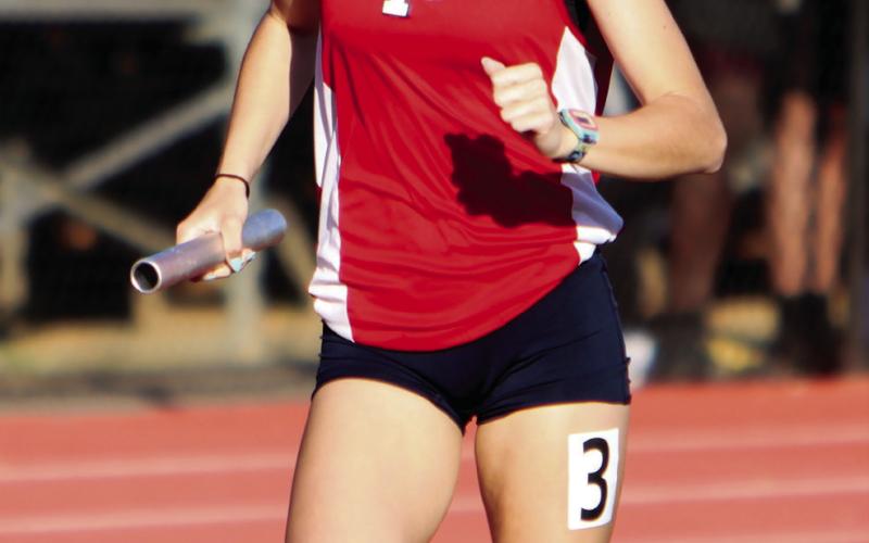 PCHS senior Lily Frisch paces herself during the 4x800-meter relay during a meet at Greene County last week. LANCE MCCURLEY/Staff