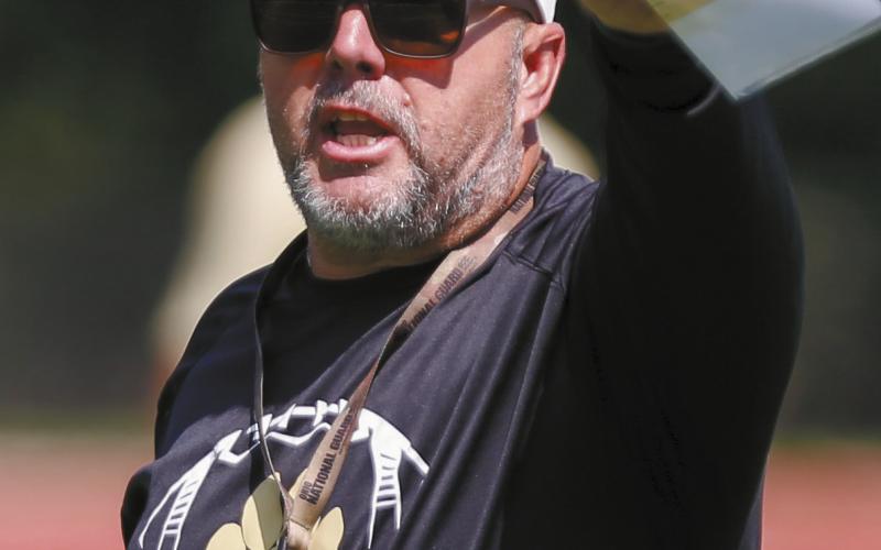Chris MacFarland, Greene County’s third head coach in as many years, intends to bring back stability to its football program. LANCE McCURLEY/Staff
