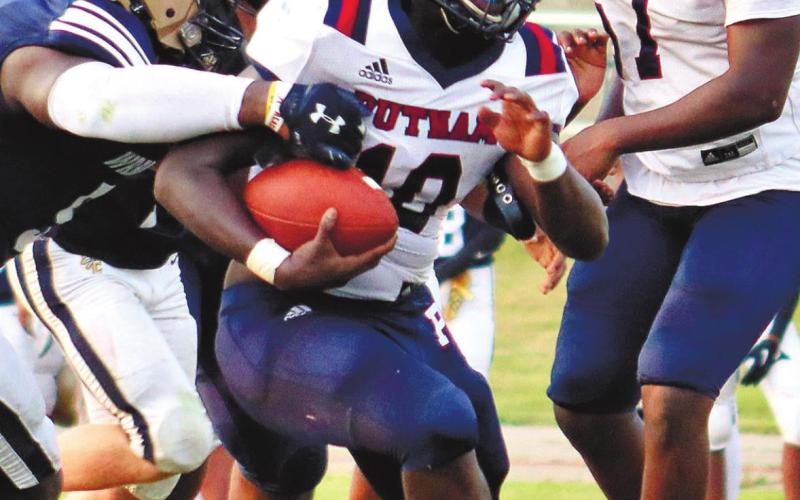 Rashod Daniel (10) carries the rock against Jefferson. ARELLA CASH/Staff
