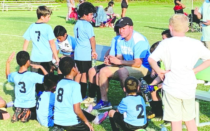 Coach Francisco Jimenez is getting his youth soccer team ready. CONTRIBUTED