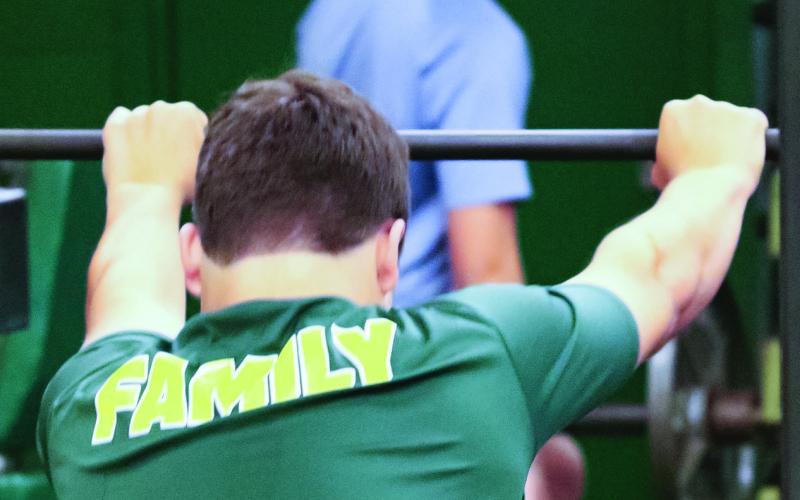 Gatewood coaches want their players to be like “family” to each other, committed to helping whether in the gym or on the football field. TREY NORRIS/Staff