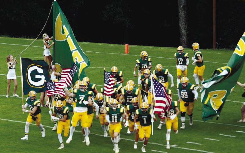 In a game earlier this season, the Gatewood Gators take the field at Sammons Field in Eatonton. IAN TOCHER/File photo
