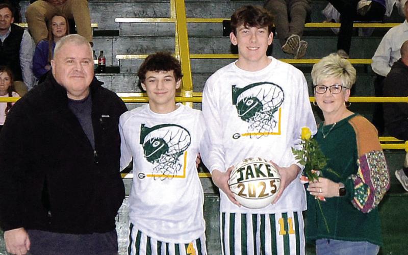 Basketball player Jake Rich (third from left) was accompanied by his parents Pattie and Marshall, as well as teammate Landon Moreno. A member of the Phoenix Chapter of the National Honor Society, Jake plans to attend the University of Georgia to major in cyber security. IAN TOCHER/Staff