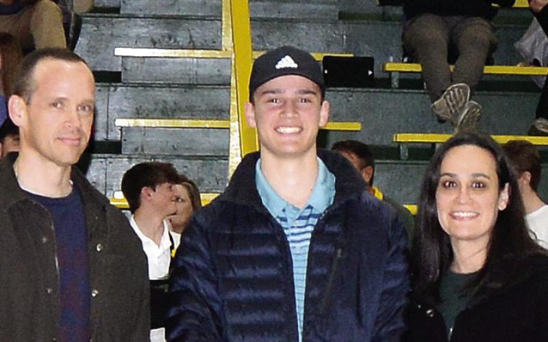 Adam Harvey from the wrestling team was escorted by his parents Rachel and Sam Harvey. He plans to attend Chattahoochee Technical College to earn a biomedical degree. IAN TOCHER/Staff