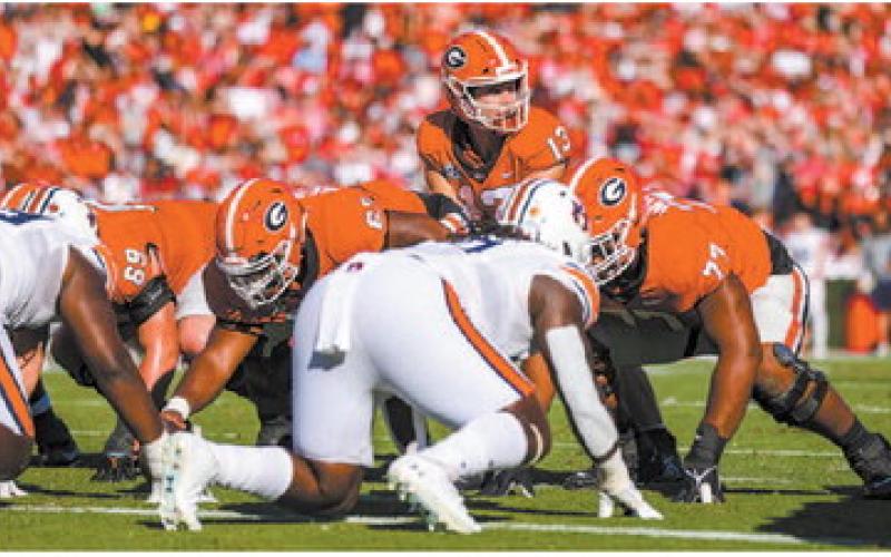 Georgia quarterback Stetson Bennett prepares for a play under center against Auburn TONY WALSH/UGA Athletics