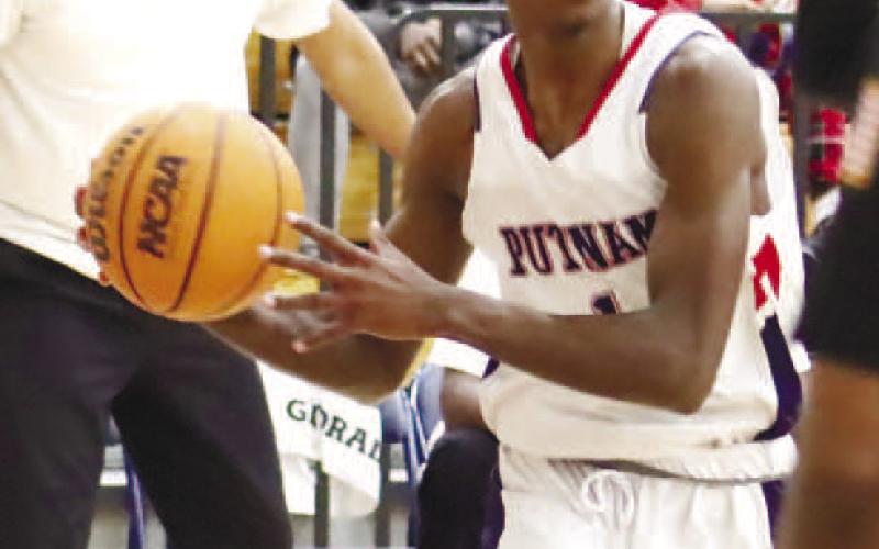 Eren Banks (4) drives the baseline against Butler. ARELLA CASH/Staff