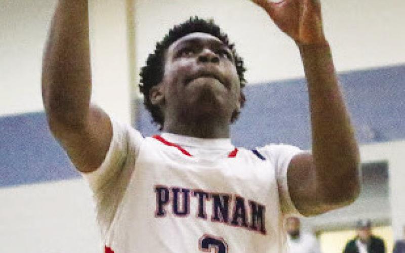 Putnam junior Jmari Greene (3) earned the Region Player of the Year award. TREY NORRIS/Staff
